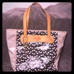 Fossil purse with birds